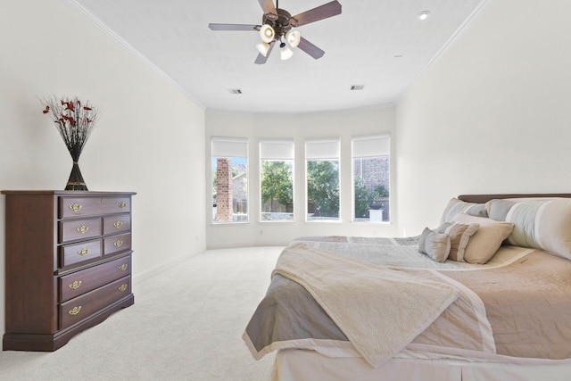 8611 Springmere Ct, Houston, TX 77095 - bedroom with crown molding, carpet floors, and a ceiling fan