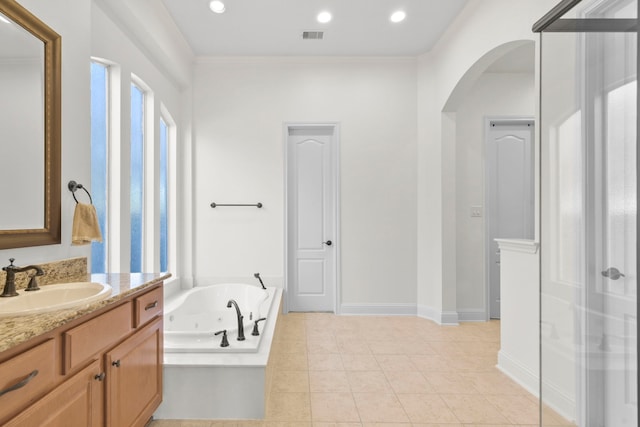 8611 Springmere Ct, Houston, TX 77095 - full bath featuring vanity, a jetted tub, tile patterned flooring, and recessed lighting