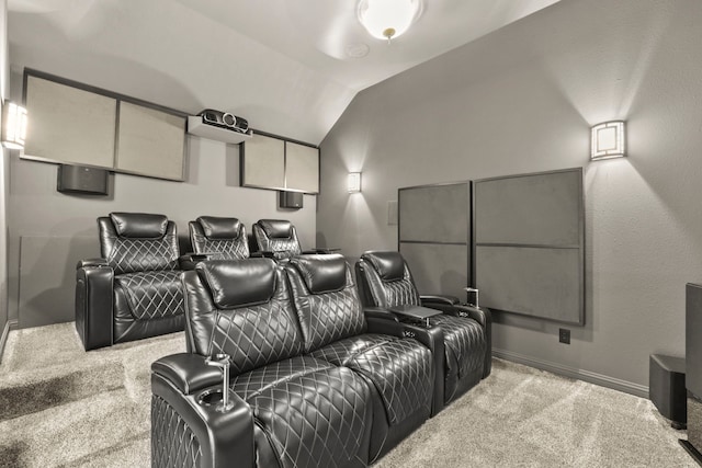 8611 Springmere Ct, Houston, TX 77095 - carpeted home theater featuring lofted ceiling and baseboards