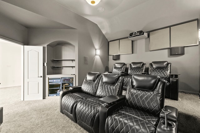 8611 Springmere Ct, Houston, TX 77095 - carpeted cinema room featuring vaulted ceiling and baseboards