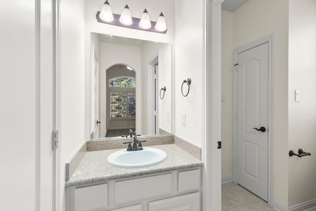 8611 Springmere Ct, Houston, TX 77095 - bathroom featuring vanity, tile patterned flooring, and baseboards