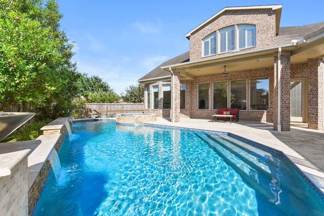 8611 Springmere Ct, Houston, TX 77095 - view of swimming pool featuring a patio area, a fenced backyard, and a pool with connected hot tub