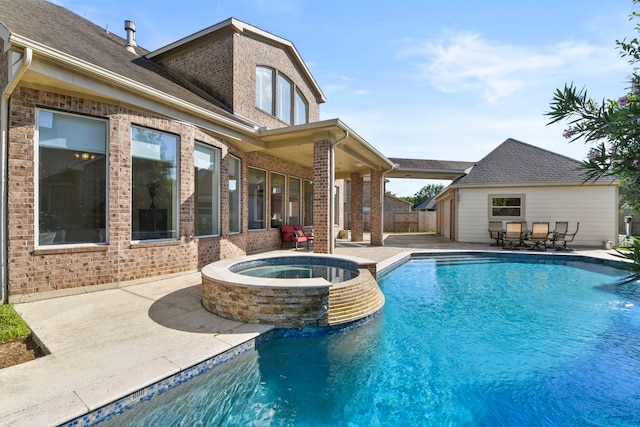 8611 Springmere Ct, Houston, TX 77095 - view of pool featuring a patio area and a pool with connected hot tub