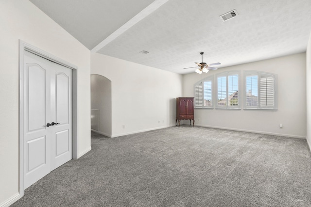 8611 Springmere Ct, Houston, TX 77095 - unfurnished room featuring a ceiling fan, carpet floors, baseboards, and arched walkways