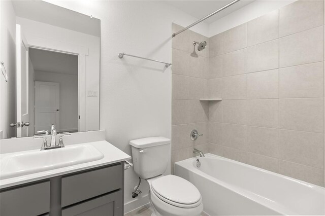 8307 Red Shiner Way, Fulshear, TX 77441 - full bathroom with toilet, vanity, and shower / tub combination