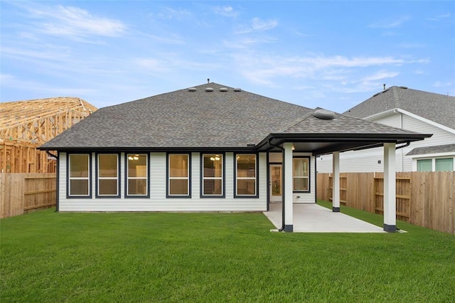 8307 Red Shiner Way, Fulshear, TX 77441 - back of property with roof with shingles and a patio