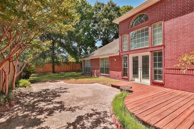 11719 Emerald Woods Dr, Houston, TX 77070 - wooden deck featuring a fenced backyard and french doors