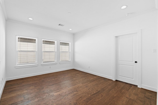 13415 Scott St, Houston, TX 77047 - unfurnished room featuring ornamental molding, dark wood-style flooring, baseboards, and recessed lighting