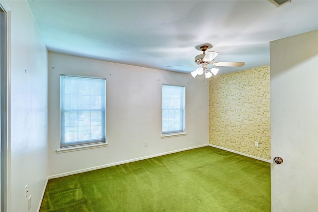 7907 Aleta Dr, Spring, TX 77379 - empty room with healthy amount of natural light, baseboards, carpet floors, and a ceiling fan