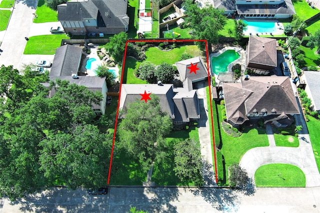 7907 Aleta Dr, Spring, TX 77379 - aerial perspective of suburban area featuring a pool area and property parcel outlined