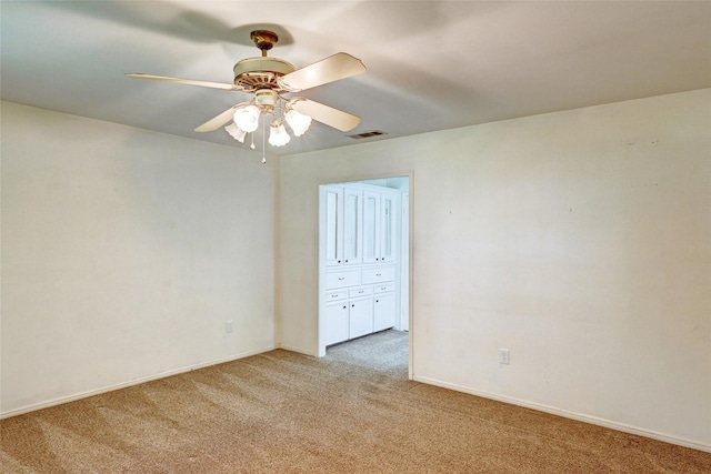 7907 Aleta Dr, Spring, TX 77379 - unfurnished room with light colored carpet, baseboards, and ceiling fan