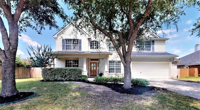 2506 Foxcrest Dr, Katy, TX 77494 - traditional-style house with brick siding, an attached garage, and concrete driveway