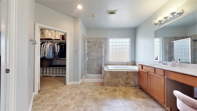 2506 Foxcrest Dr, Katy, TX 77494 - full bath featuring a shower stall, a bath, a walk in closet, and vanity