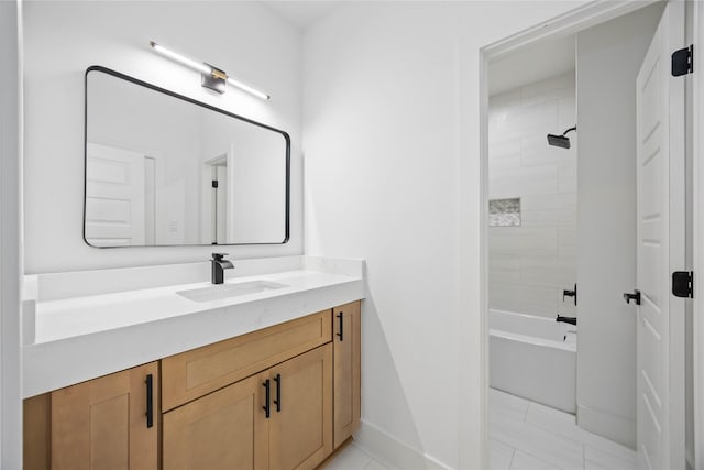 full bathroom with baseboards, vanity, tile patterned flooring, and bathtub / shower combination