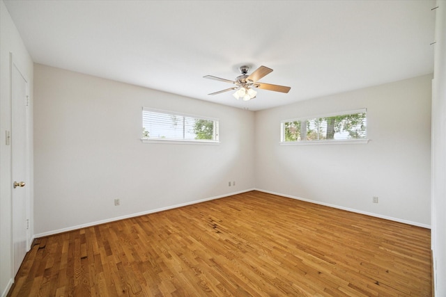 14303 Bonney Brier Dr, Houston, TX 77069 - spare room featuring wood finished floors, ceiling fan, and baseboards