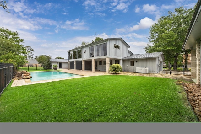 14303 Bonney Brier Dr, Houston, TX 77069 - back of house featuring board and batten siding and a patio area