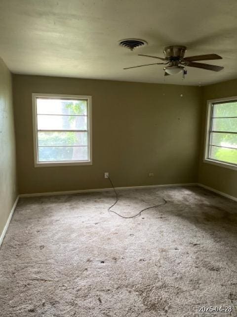1912 18th St, Huntsville, TX 77340 - unfurnished room featuring carpet, baseboards, and ceiling fan