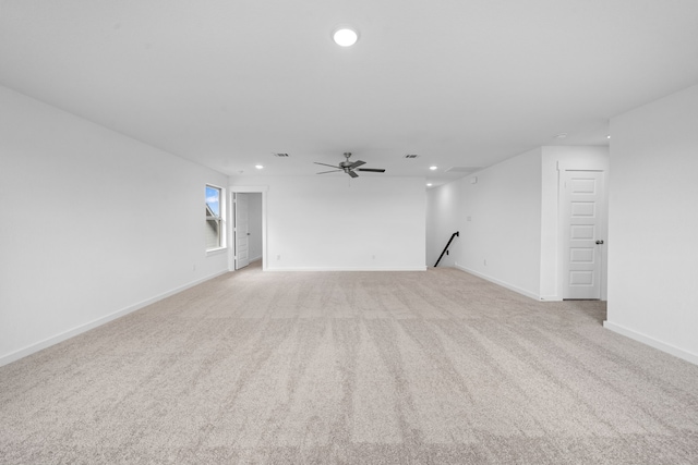 15198 Prairie Mill Dr, New Caney, TX 77357 - unfurnished living room featuring recessed lighting, light carpet, and ceiling fan
