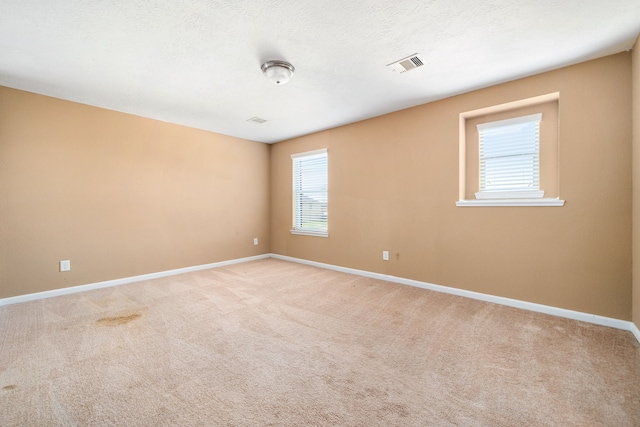 2706 Redwing Grove Way, Houston, TX 77038 - unfurnished room featuring baseboards and light colored carpet