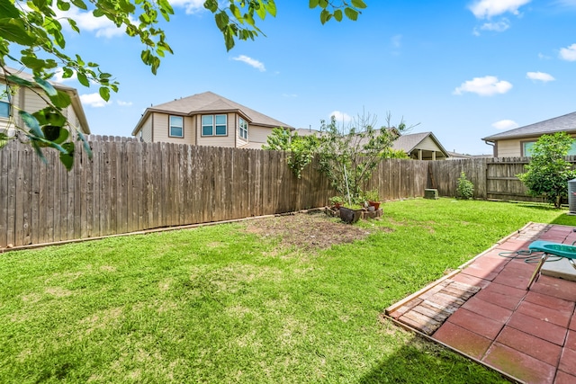 view of yard featuring central AC