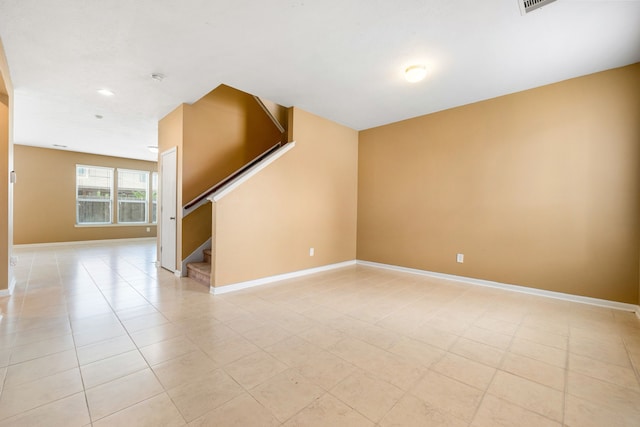 2706 Redwing Grove Way, Houston, TX 77038 - spare room with stairway, baseboards, recessed lighting, and light tile patterned floors