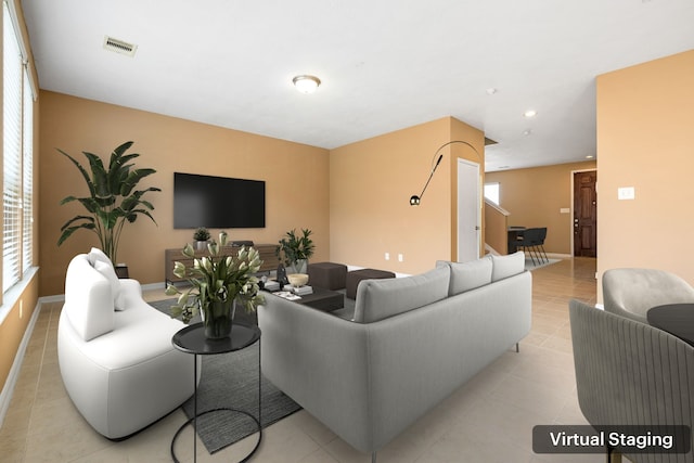 2706 Redwing Grove Way, Houston, TX 77038 - living room featuring baseboards, recessed lighting, and light tile patterned floors