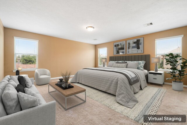 2706 Redwing Grove Way, Houston, TX 77038 - bedroom with multiple windows, light carpet, and baseboards
