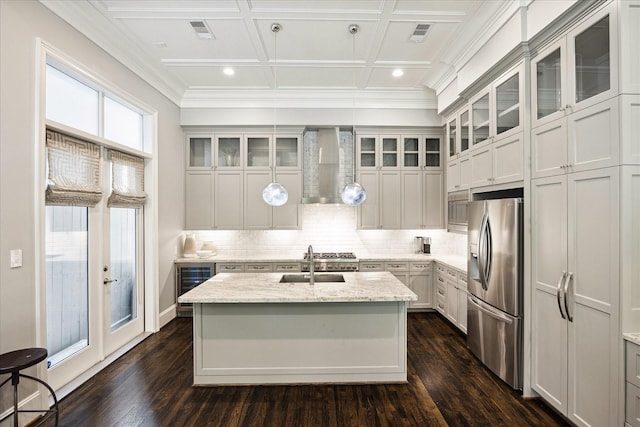 kitchen featuring stainless steel fridge with ice dispenser, wall chimney exhaust hood, beverage cooler, a sink, and dark wood-style flooring