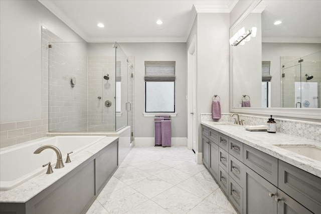 bathroom with a shower stall, recessed lighting, a bath, crown molding, and double vanity