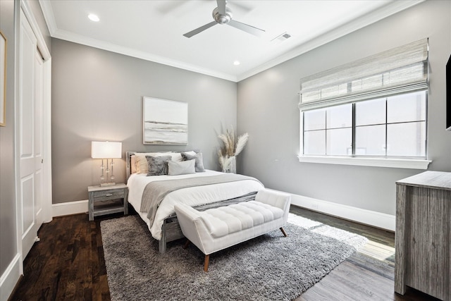 bedroom with crown molding, baseboards, wood finished floors, recessed lighting, and a ceiling fan