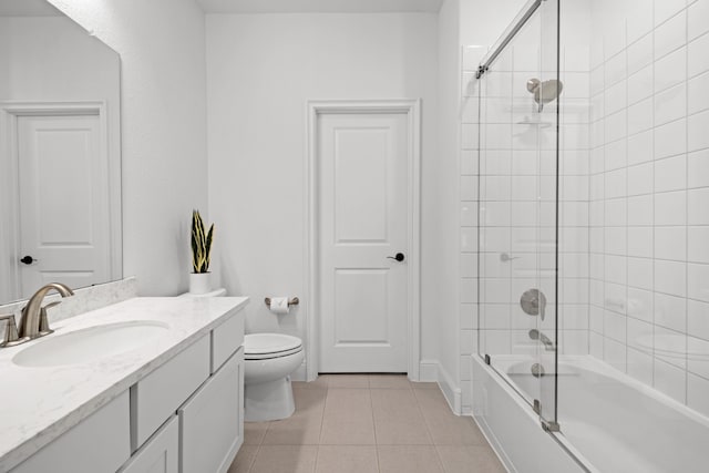 5357 Cherry Spring Dr, Spring, TX 77386 - bathroom featuring tile patterned flooring, toilet, vanity, and tub / shower combination