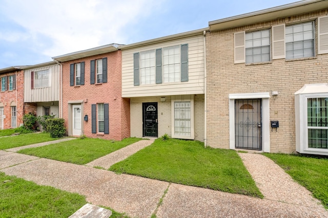 7938 Leonora St Unit B19, Houston, TX 77061 - view of property with a front lawn