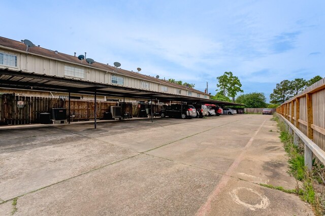 7938 Leonora St Unit B19, Houston, TX 77061 - covered parking lot with fence