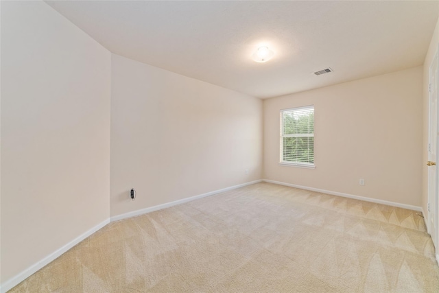 21514 Skyla Cir, Humble, TX 77338 - unfurnished room with baseboards and light carpet