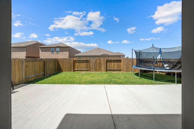 6263 El Turquesa Dr, Houston, TX 77048 - view of yard featuring a trampoline and a patio