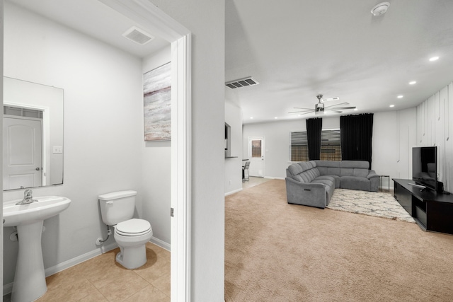 6263 El Turquesa Dr, Houston, TX 77048 - bathroom with toilet, a ceiling fan, baseboards, recessed lighting, and a sink