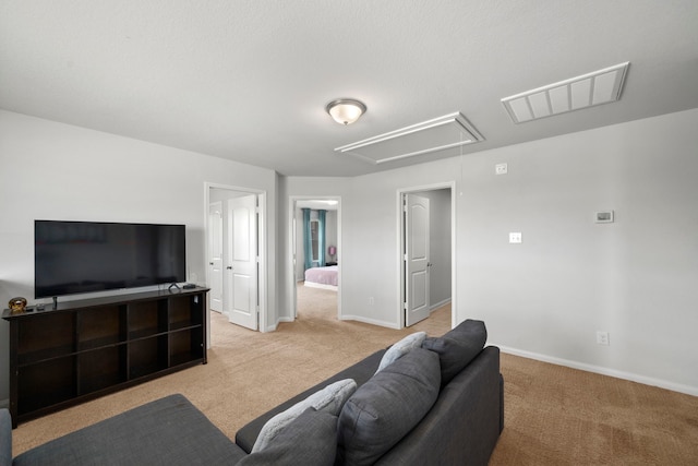 6263 El Turquesa Dr, Houston, TX 77048 - living room featuring attic access, light carpet, and baseboards