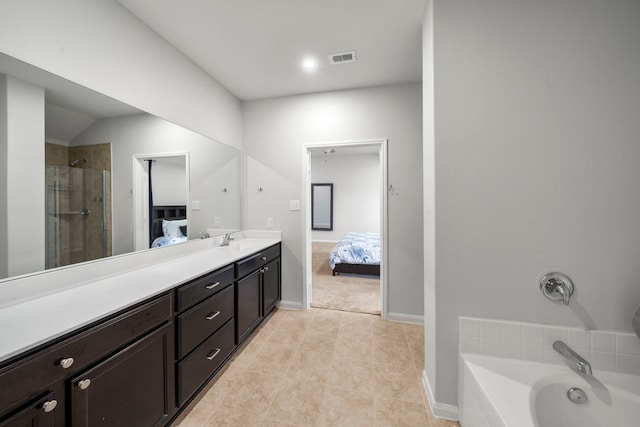 6263 El Turquesa Dr, Houston, TX 77048 - bathroom with connected bathroom, a tile shower, vanity, and a tub