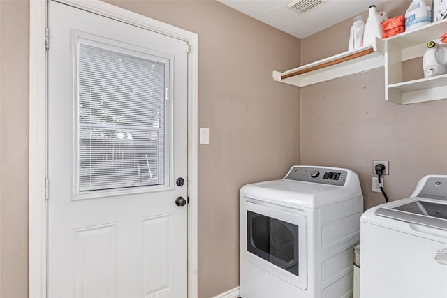 18406 Bristol Bay Ct, Humble, TX 77346 - clothes washing area with washing machine and clothes dryer
