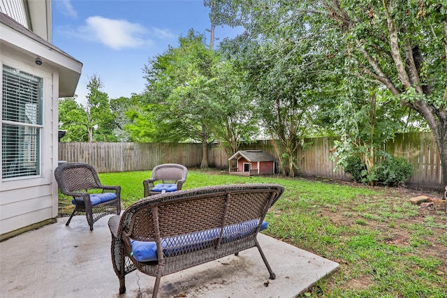 18406 Bristol Bay Ct, Humble, TX 77346 - view of yard with a patio, a storage unit, and an outdoor structure