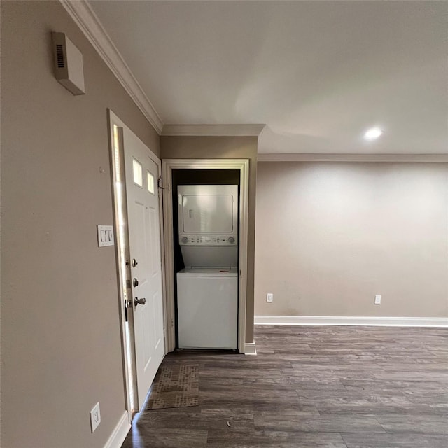 1311 Antoine Dr Unit 155, Houston, TX 77055 - foyer entrance featuring stacked washing machine and dryer, crown molding, dark wood-style floors, and baseboards