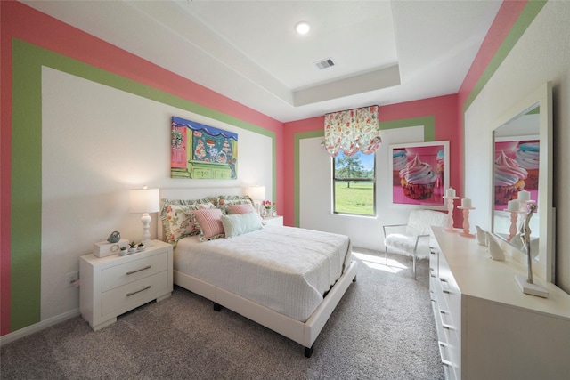 bedroom with light colored carpet, a chandelier, a raised ceiling, and recessed lighting
