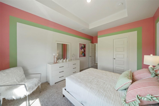 bedroom with light colored carpet