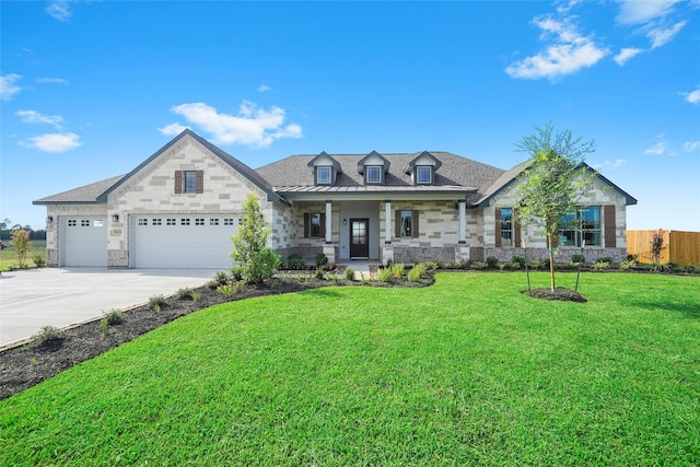 view of front of home with stone siding, concrete driveway, a garage, and covered porch
