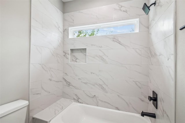 full bath featuring  shower combination and toilet