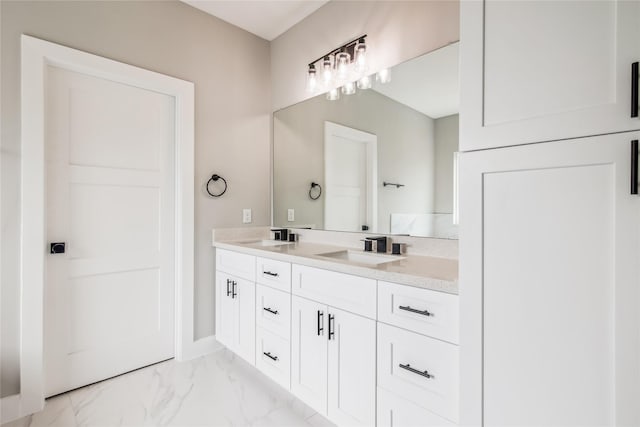 full bathroom with double vanity and marble look tiles