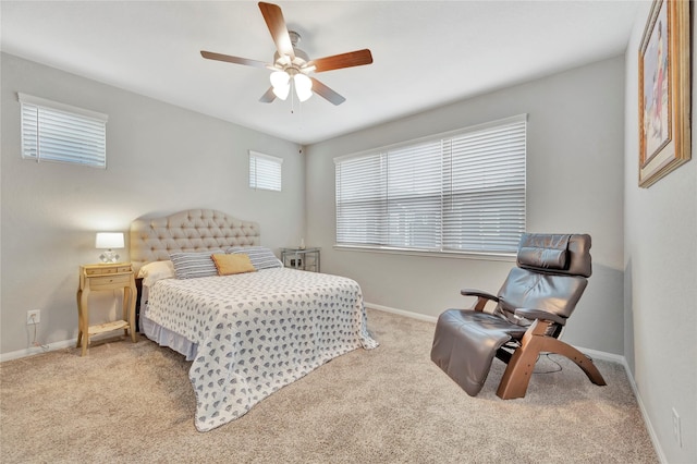 bedroom featuring carpet, baseboards, and ceiling fan