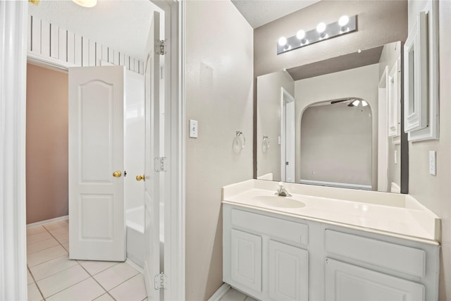 17406 Lonesome Dove Trl, Houston, TX 77095 - bathroom featuring tile patterned floors, vanity, and baseboards