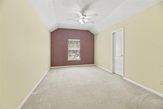 17406 Lonesome Dove Trl, Houston, TX 77095 - bonus room with a ceiling fan, vaulted ceiling, carpet flooring, baseboards, and a textured ceiling
