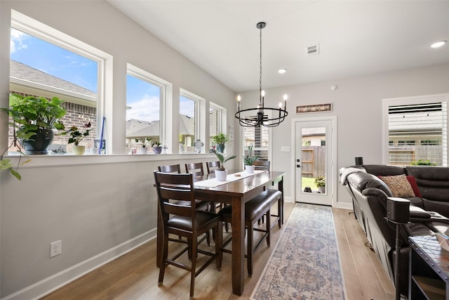 29622 Cedar Elm Way, Tomball, TX 77375 - dining room featuring plenty of natural light, light wood finished floors, a chandelier, baseboards, and recessed lighting